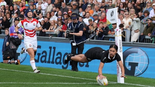 New Zealand's full back Braxton Sorensen-McGee (R) sores a try during the Women’s Rugby World Cup pool C match between New Zealand and Japan at Sandy Park, Exeter, southwest England, on August 31, 2025.
