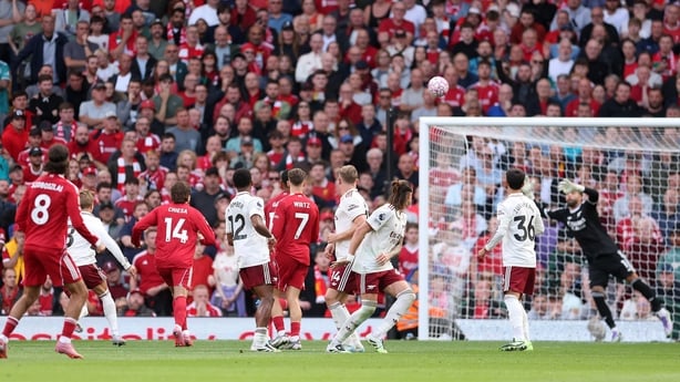 LIVERPOOL, ENGLAND - AUGUST 31: Dominik Szoboszlai of Liverpool scores his team's first goal in a free kick during the Premier League match between Liverpool and Arsenal at Anfield on August 31, 2025 in Liverpool, England. (Photo by Alex Pantling/Getty Images)