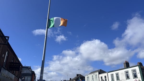 An Irish flag erected on a pole