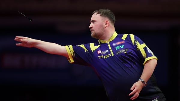 BLACKPOOL, ENGLAND - JULY 26: Luke Littler of England throws during the Semi-Final match between Luke Littler of England and Josh Rock of Northern Ireland on day eight of the 2025 Betfred World Matchplay at Winter Gardens on July 26, 2025 in Blackpool, En