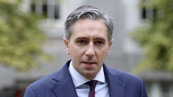 A photograph of Simon Harris
