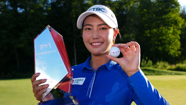 Miranda Wang of China poses with the winner's trophy and her Titleist golf ball after winning the FM Championship 2025 at TPC Boston on August 31, 2025 in Norton, Massachusetts.