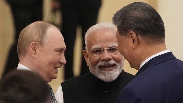 Photo shows Indian Prime Minister Narendra Modi talking with Russian President Vladimir Putin and Chinese President Xi jinping ahead of the Shanghai Cooperation Organization (SCO) Summit