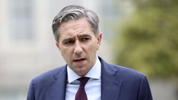 a photograph of simon harris