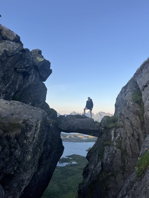 A shot of someone climbin a mountain