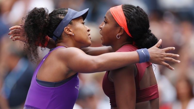 Naomi Osaka and Coco Gauff embrace after their fourth-round encounter at Flushing Meadows