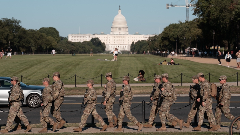 A National Guard unit patrols the National Mall in Washington, DC