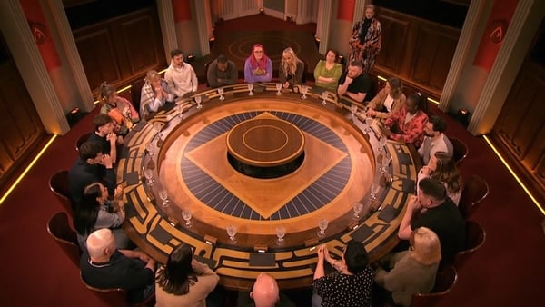 The contestants gather around the round table on The Traitors Ireland