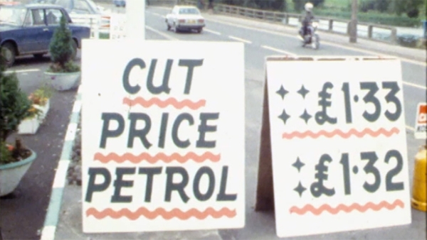 Signs for cut price petrol in Enniskillen, County Fermanagh, 1980.