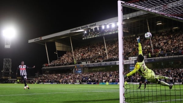 Clarke Oduor of Grimsby Town has his penalty saved by Manchester United goalkeeper Andre Onana during the Carabao Cup Second Round match between Grimsby Town and Manchester United at Blundell Park on August 27, 2025 in Grimsby, England.