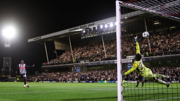 Clarke Oduor of Grimsby Town has his penalty saved by Manchester United goalkeeper Andre Onana during the Carabao Cup Second Round match between Grimsby Town and Manchester United at Blundell Park on August 27, 2025 in Grimsby, England. 