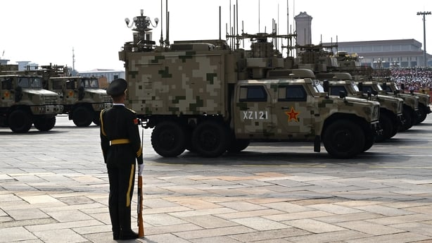 Military vehicles take part in a military parade marking the 80th anniversary of victory over Japan and the end of World War II, in Beijing's Tiananmen Square