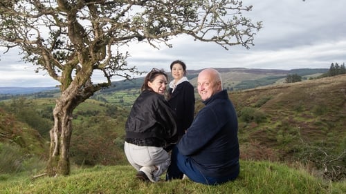 Yang Qin and Zhang Li, who are panda guardians, with Pat Rigney of Drumshanbo Nature Reserve