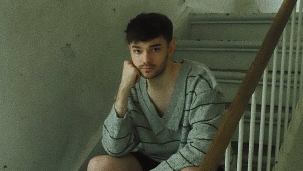 A man sitting on a staircase