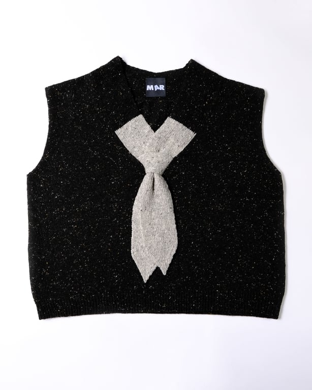 A black knitted vest with an illusion tie