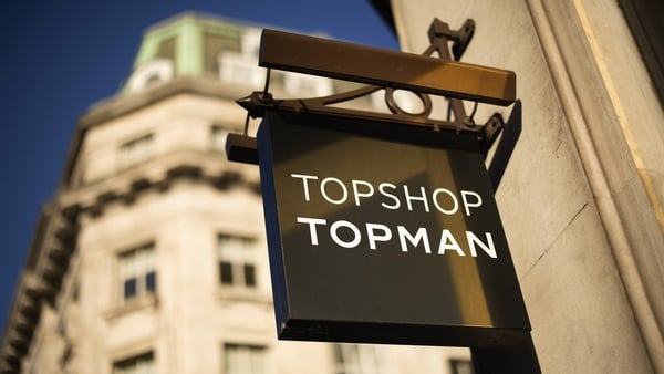 A logo outside a Topshop store
