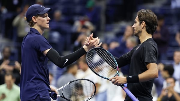 NEW YORK, NEW YORK - SEPTEMBER 03: Lorenzo Musetti (R) of Italy shakes hands with Jannik Sinner of Italy after his defeat in the Men's Quarterfinal match on Day Eleven of the 2025 US Open at USTA Billie Jean King National Tennis Center on September 3, 202