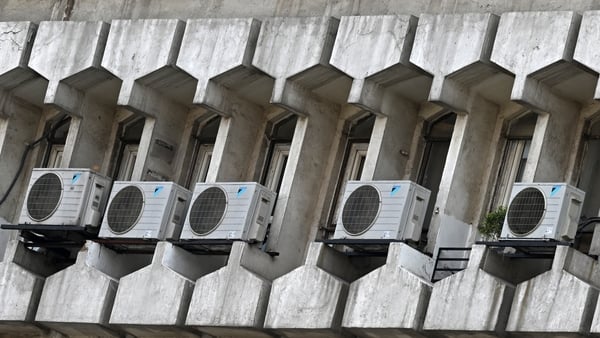 A general view of air conditioning units installed on the outside of a facade of a building in India