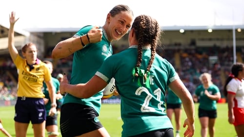 Emily Lane (r) congratulates Anna McGann after she scored her second try in Ireland's win against Spain last week