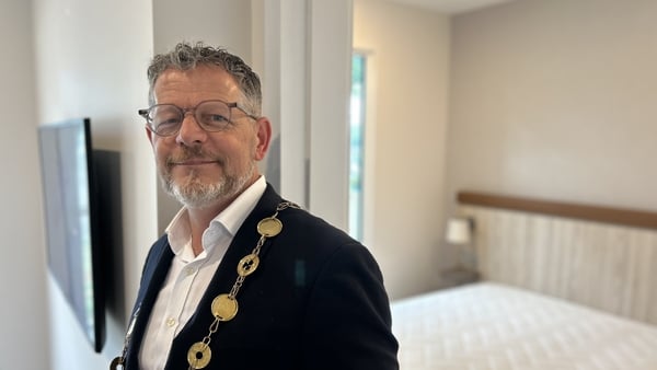 A picture of Limerick Mayor John Moran inside a modular home