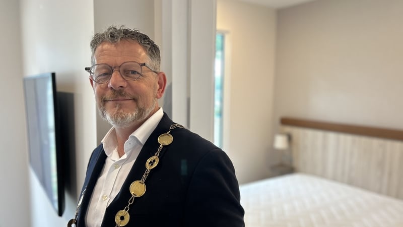 A picture of Limerick Mayor John Moran inside a modular home