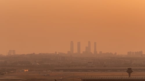 A view of the Madrid skyline and Madrid airport during sunset last month, when Spain and Portugal experianced unprecedented wildfires