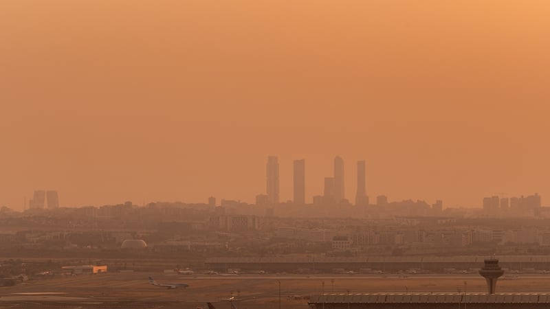 A view of the Madrid skyline and Madrid airport during sunset last month, when Spain and Portugal experianced unprecedented wildfires