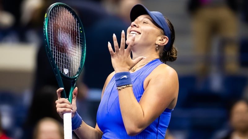 An elated Amanda Anisimova celebrates her victory