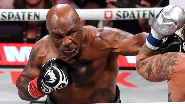 Mike Tyson, left, and Jake Paul during their heavyweight bout at AT&T Stadium in Arlington, Texas
