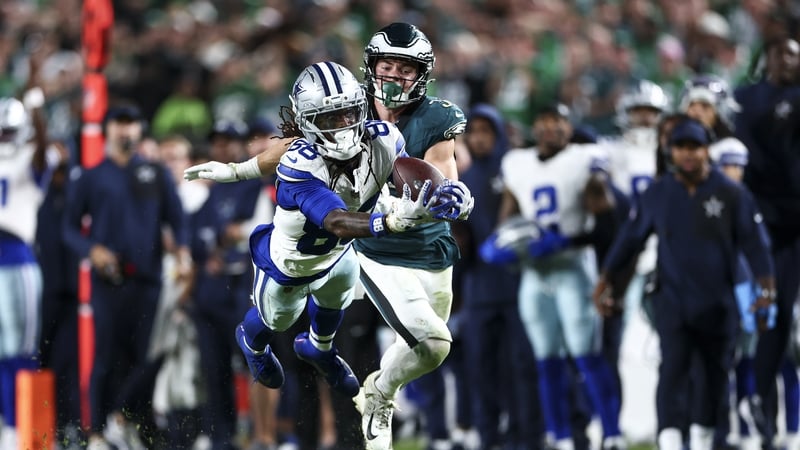 CeeDee Lamb, left, of the Dallas Cowboys attempts to catch a pass in the NFL season opener against the Philadelphia Eagles