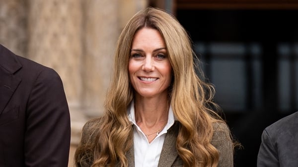 A photo of Kate Middleton with her hair down and lightly waved