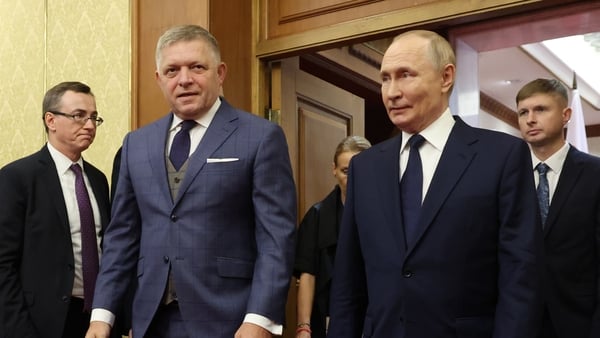 BEIJING, CHINA - SEPTEMBER 2 (RUSSIA OUT) Russian President Vladimir Putin (R) and Slovak Prime Minister Robert Fico (L) enter the hall during their bilateral meeting, September 2, 2025, in Beijing, China. Presidengt Putin is visiting China and will atten
