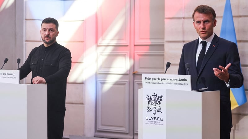 Volodymyr Zelensky and Emmanuel Macron speak during a press conference following the 'Coalition of the Willing' summit