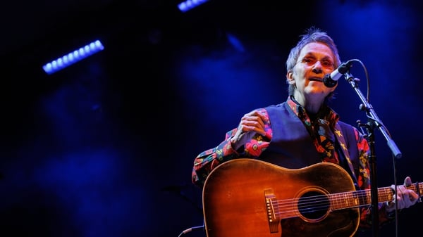 Landscape shot of US singer Mary Gauthier performing in the Ryman Auditorium