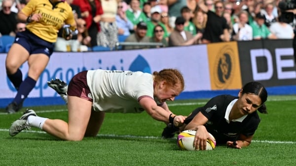 New Zealand's wing Braxton Sorensen-McGee scores the team's third try during the Women’s Rugby World Cup pool C match between New Zealand and Ireland at Yo