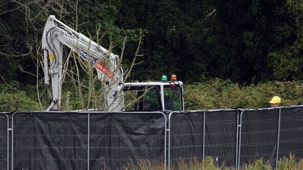 A mini digger at the site of the search of a missing boy in north county Dublin
