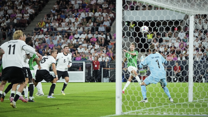 Isaac Price scores Northern Ireland's equaliser against Germany in Cologne