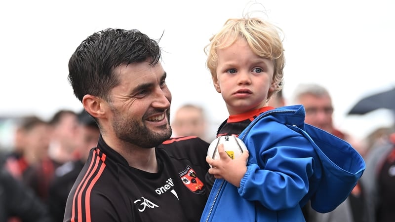 Ballygunner goalkeeper Stephen O'Keeffe with his son Fionn after Sunday's final win