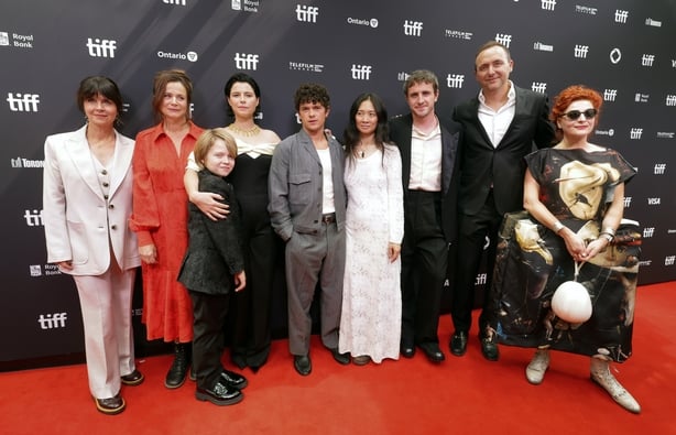 TORONTO, ONTARIO - SEPTEMBER 07: (L-R) Producer Liza Marshall, Emily Watson, Jacobi Jupe, Jessie Buckley, Noah Jupe, director/writer/executive producer Chloé Zhao, Paul Mescal, producer Nicolas Gonda and costume designer Malgosia Turzanska seen at the Premiere Of Focus Features' "Hamnet" at the 2025