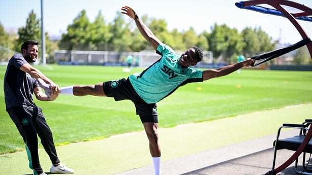 8 September 2025; Chiedozie Ogbene stretches with the help of strength and conditioning coach Pepe Lázaro Ramírez during a Republic of Ireland training session at the AFF Technical Center Academy in Yerevan, Armenia. Photo by Stephen McCarthy/Sportsfile