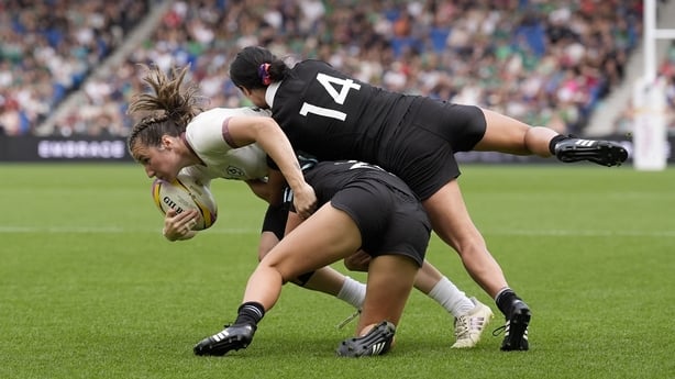 Ireland's Eve Higgins (left) is tackled