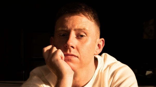 Landscape shot of irish singer Conleth