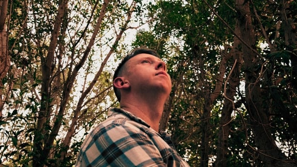 landscape shot of Irish singer Conleth Mc Geary