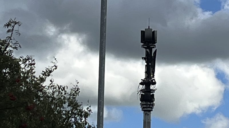 The damaged 5G telecommunications mast on the Whiterock Road in west Belfast