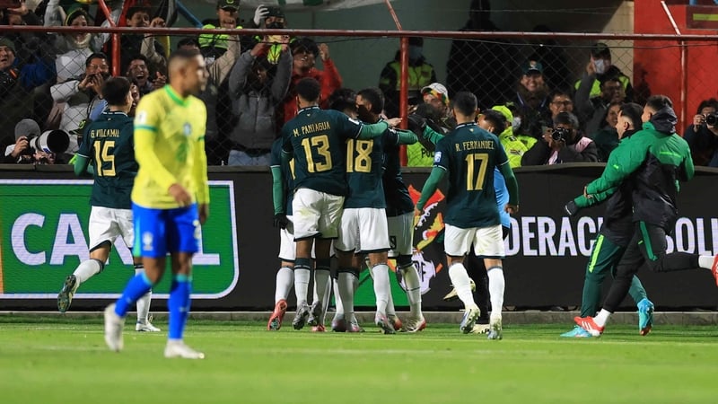 Bolivian players celebrate Miguel Terceros' match-winning penalty