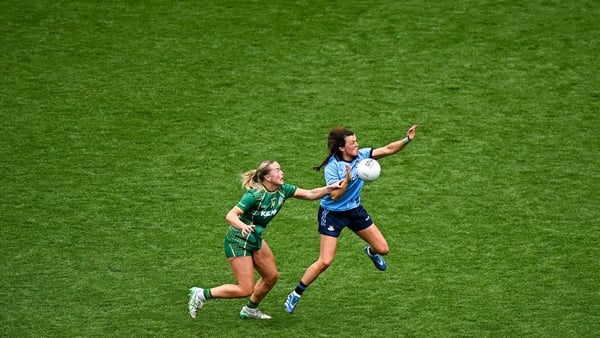 Dublin's Leah Caffrey wins possession in front of Meath forward Vikki Wall during last month's All-Ireland football final