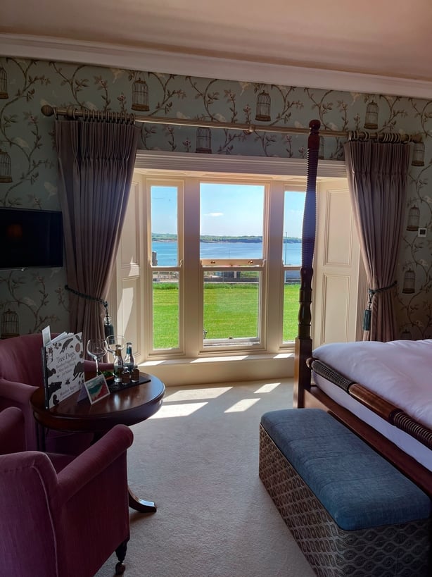 A hotel bedroom overlooking the sea