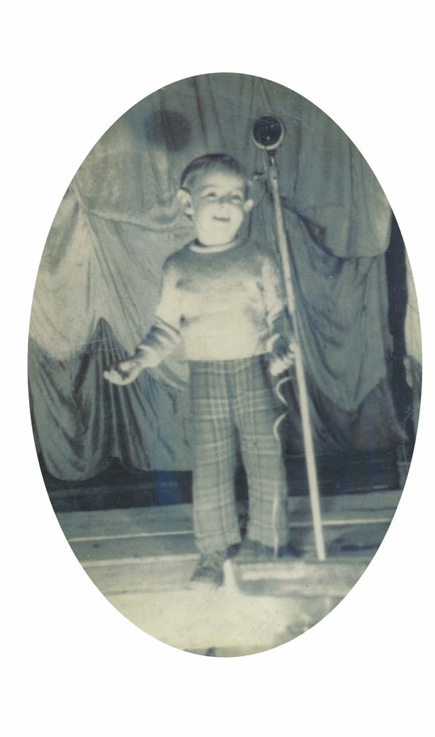 Sandy Kelly performing onstage at the age of three