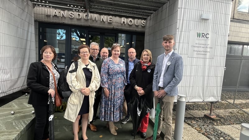 School secretaries and caretakers, along with Fórsa representatives at the WRC