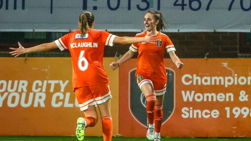 Amy Anderson of Glasgow City (R) celebrates with Erin McLaughlin after scoring her side's opening goal